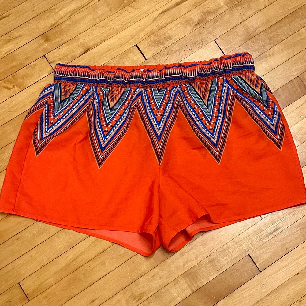 Boutique Orange Shorts w/ Triangular, Colorful, Geometric Design. Elastic waist.